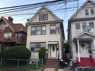 Large 2 family, semi-attached, corner property